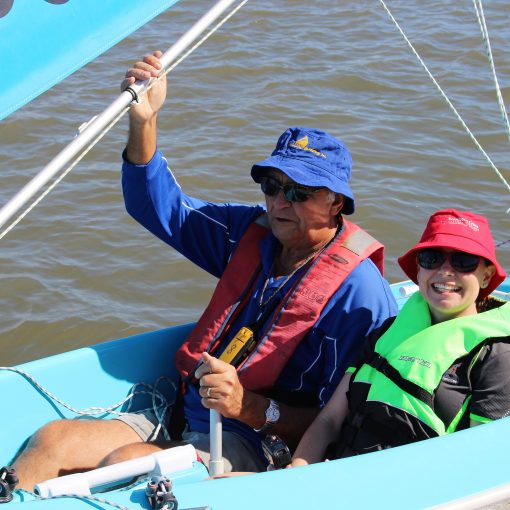 Two people in boat for supported care outing via NDIS