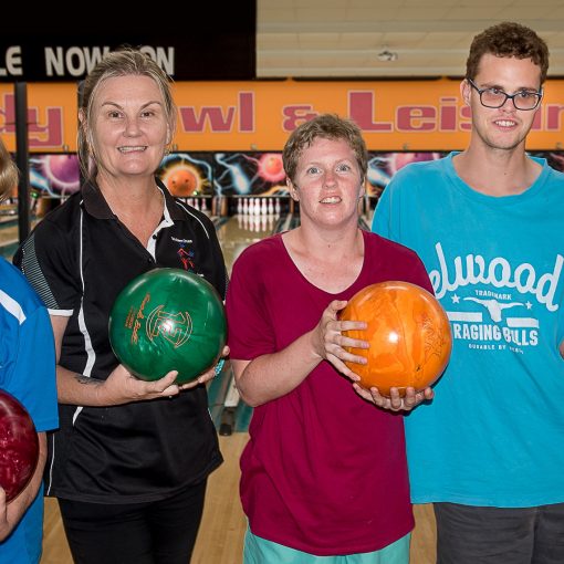 5 people on community bowling outing, funded by NDIS plan