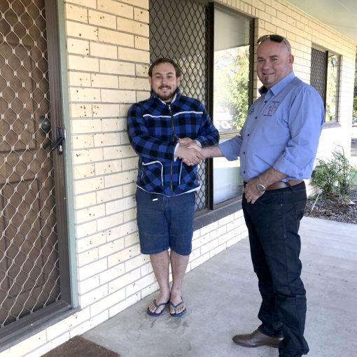 Hand over of SDA housing to young man